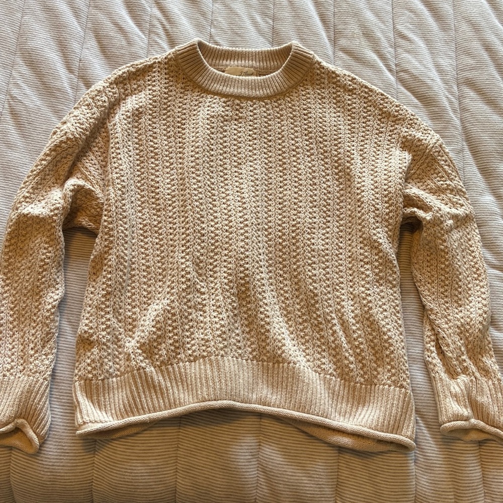 Cream Universal Threads knit sweater.